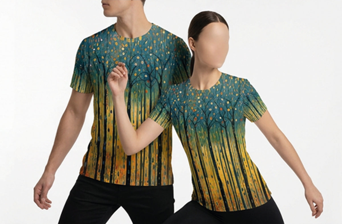 Two models wearing matching short-sleeve crewneck t-shirts with a vertical forest pattern in teal, green, yellow, and orange.
